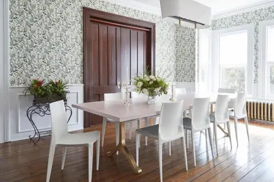 a dining room with a table and white chairs at The Kent Collection - The Victorian in Kent