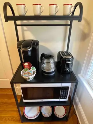 a black shelf with a microwave and a coffee maker at Entire Beautiful 2BR Apartment [L]. Convenient location in the heart of Queens! in Whitestone
