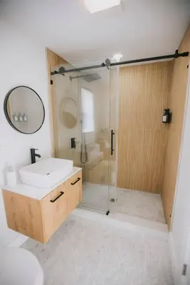 a bathroom with a sink and a shower at Villa Costello, in Kingston
