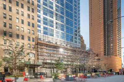 a group of tall buildings in a city at Financial District 1br w WD gym elevator NYC-1368 in New York