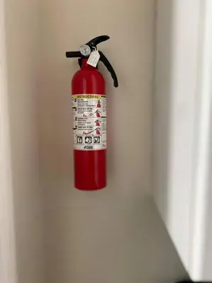 a fire hydrant is hanging on a wall at Classic King Suite Apartment in Schenectady