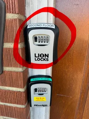 a sign that says iron locks next to a door at Cozy Apartments Woodside near Manhattan in Queens