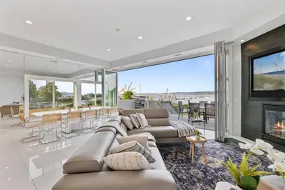 a living room with a couch and a fireplace at Piermont Waterfront Villa! in Piermont