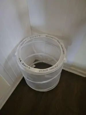 a bucket in the corner of a room at Rock Pad AirBnB in New Haven