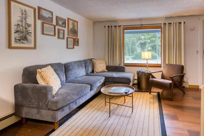 a living room with a couch and a table at Berkshire Valley Inn in Williamstown