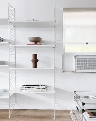 a white kitchen with white shelves and a microwave at Luxury Poconos Home Near Skiing, Lakes, & Waterparks in Tobyhanna