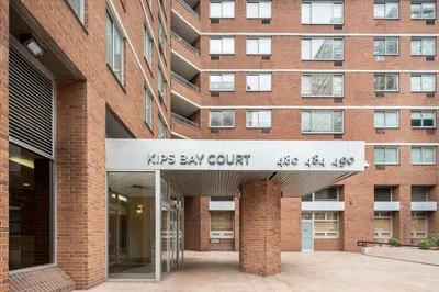 a brick building with a sign that reads kips bay court at Kips Bay 1br w doorman wd gym nr hospital NYC-1402 in New York