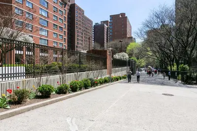 people walking down a sidewalk in a city with buildings at Kips Bay 1br w doorman wd gym nr hospital NYC-1402 in New York