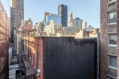 a view of a city skyline from a building at Lenox Hill 2br w elevator doorman nr art NYC-1389 in New York