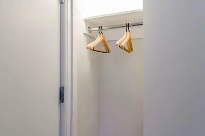 a pair of lights hanging from a door at Lenox Hill 2br w elevator doorman nr art NYC-1389 in New York