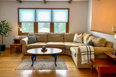 a living room with a couch and a coffee table at Vacation Rental Home about 2 Mi to Windham Mountain! in Windham