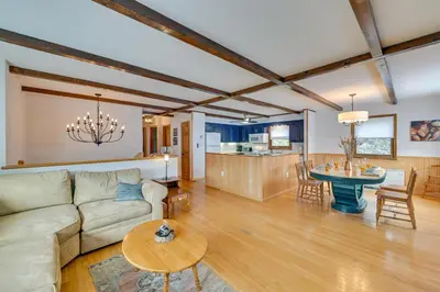 a living room with a couch and a table at Vacation Rental Home about 2 Mi to Windham Mountain! in Windham