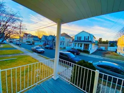 a view from the front porch of a house at Bright, Stylish & Cozy 2Bed Unit w/Backyard & Grill Close to NYC! in Haledon