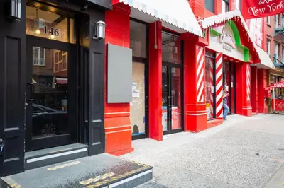 a row of shops on a city street at Little Italy 1br w wd nr SoHo NYC-756 in New York