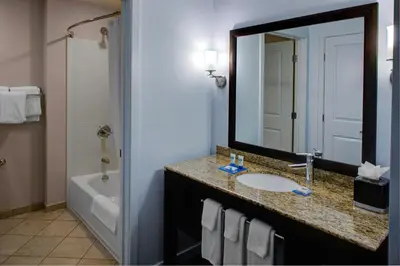 a bathroom with a sink and a mirror at HYATT House Shelton in Shelton