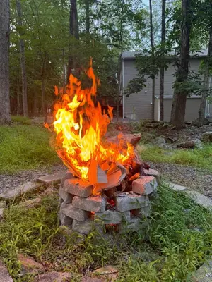 a fire pit made out of bricks in a yard at The Flying Dutchman Cottage in amenities filled Masthope community Ski Big Bear in Lackawaxen