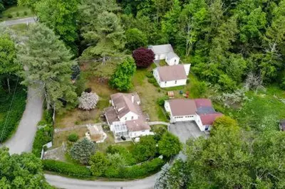 an aerial view of a house in the woods at Catskills Country House with Hot Tub near River Trails in Mount Tremper