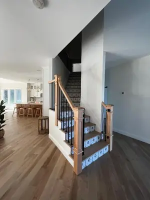 a staircase in a house with a living room at New Farmhouse, King Beds, Game Room, Hot Tub & View! in Montgomery
