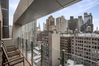 a balcony with a view of a city at Cambria Hotel New York - Chelsea in New York