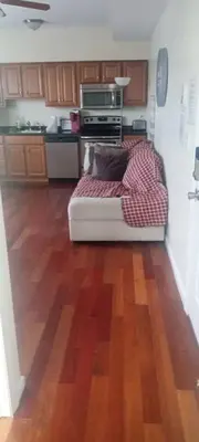 a living room with a couch in the middle of a kitchen at the rest spot in Schenectady