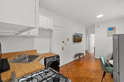a kitchen with a sink and a stove at 89-3FS Newly Furnished 2br 1bath UES in New York