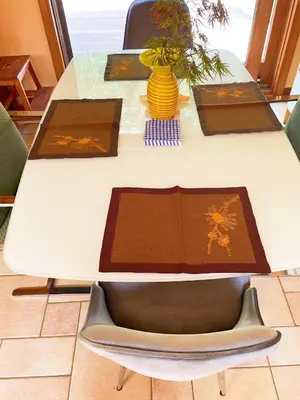 a white table with brown napkins on top of it at Sunny Peace B&B in Harwinton