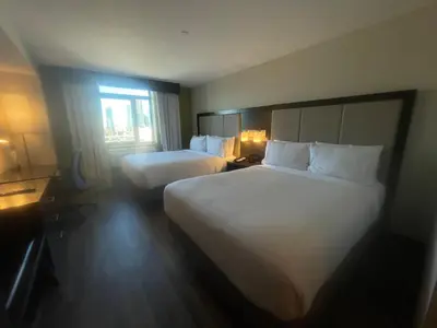 a hotel room with two beds and a window at Holiday Inn Express Long Island City E - New York by IHG in Queens