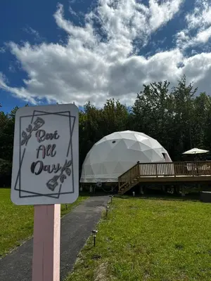 a sign that says dont die day in front of a tent at Unique Escapes - Rosé All Day Geodome in Monticello