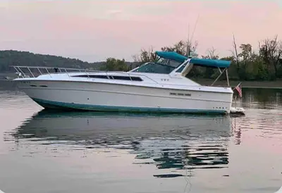 a white boat sitting on the water at Beautiful Yacht on Catskill Creek in Catskill