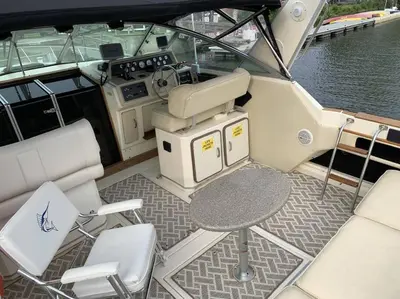 a cockpit of a boat with a table and chairs at Charming Yacht on Catskill Creek in Catskill