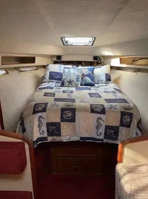 a bed in the middle of a small room at Private Yacht on Catskill Creek in Catskill