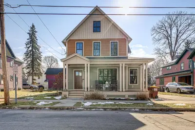 a house on the corner of a street at Elegant Saratoga Springs Stay Walk to Town, Track in Saratoga Springs