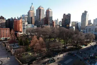 a view of a city with tall buildings at Steps from Everything - Modern 1-Bdr in Downtown's Union Square in New York