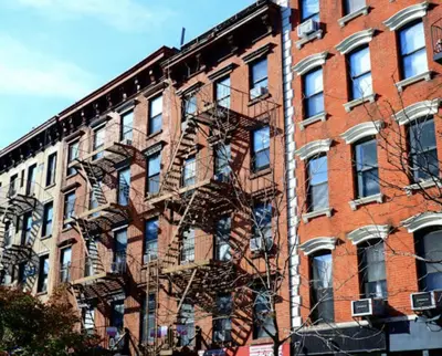 a fire escape on the side of a brick building at Oasis Retreat - Cozy studio in Union Square in New York