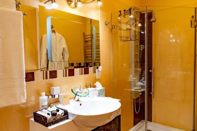 a bathroom with a sink and a shower at Cherry Valley Manor in Stroudsburg
