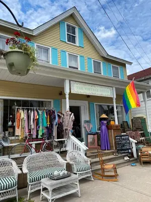 a house with a store with chairs and clothes in it at renovatedhot tubnear skiingtubingcozy & chic in Monticello