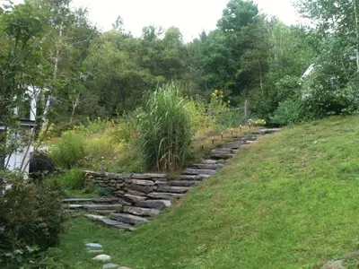 a set of stone steps leading up a hill at Deerhill Inn in West Dover