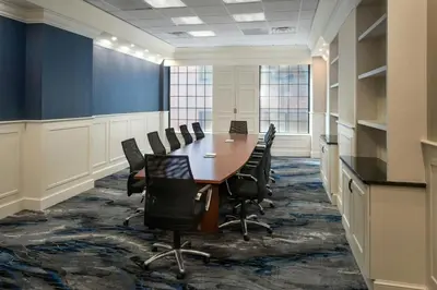 a conference room with a table and chairs at Fairfield Inn & Suites by Marriott Albany Downtown in Albany