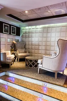 a lobby with two chairs and a table at Danfords Hotel & Marina in Port Jefferson Station