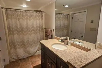 a bathroom with a sink and a shower at Escape to the Catskills in Liberty