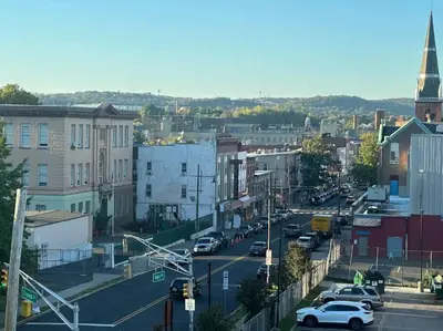 a view of a city with cars parked on a street at The Chic Suite - 1BR with Luxe Amenities in Paterson