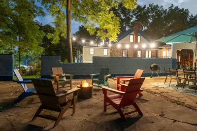 a group of chairs sitting around a fire pit at Spacious 4bd Country Gem - Fire Pit & Chill Vibes in Highland