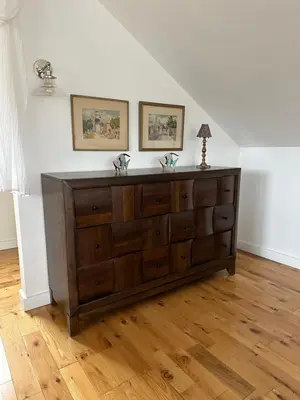 a large wooden dresser in a living room at Country House in Catskills in Saugerties