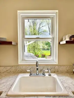 a sink in a kitchen with a window at Country House in Catskills in Saugerties