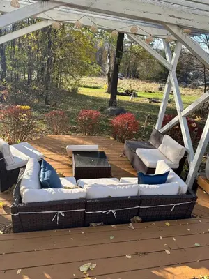 a group of couches sitting on a patio at Country House in Catskills in Saugerties