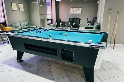 a pool table in a room with couches at Modern Condo DWNTN Hartord XL Center GYM in Hartford