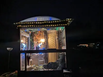 a room with a window with christmas lights at The Dome house near Hunter and Hudson in Catskill