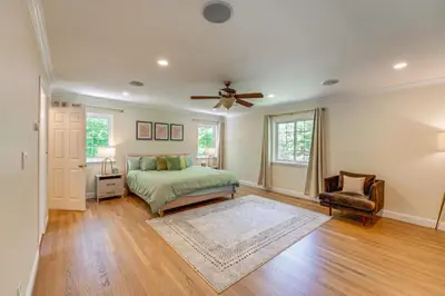 a bedroom with a bed and a ceiling fan at NYC-Area Escape Near River, Trails and MTA! in Ossining
