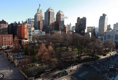 a view of a city skyline with tall buildings at Lovely Room at 3 bedroom Apt at the heart of East Village in New York