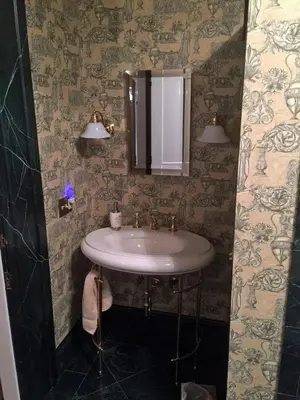 a bathroom with a sink and a mirror at Oakcliff Bed and Breakfast in Halfmoon